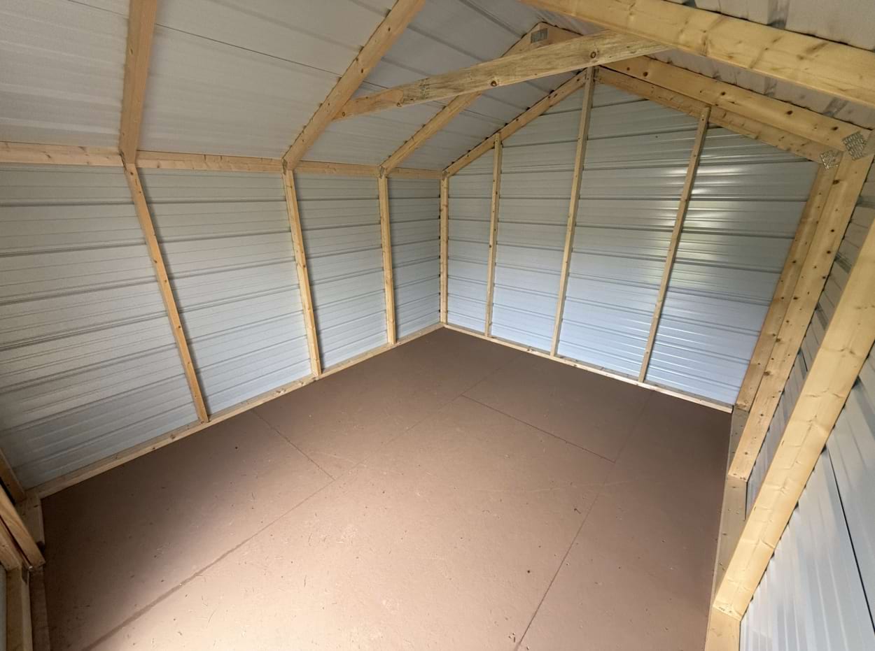 inside frame and walling of a ten by twelve metal shed