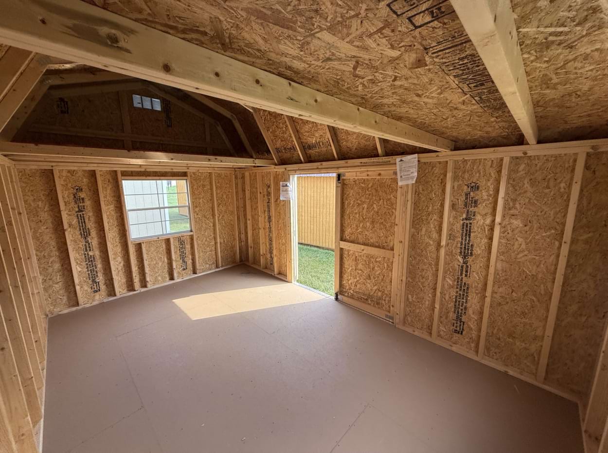 Lofted Barn that is ten feet by 16 feet framing with a window in loft and below loft