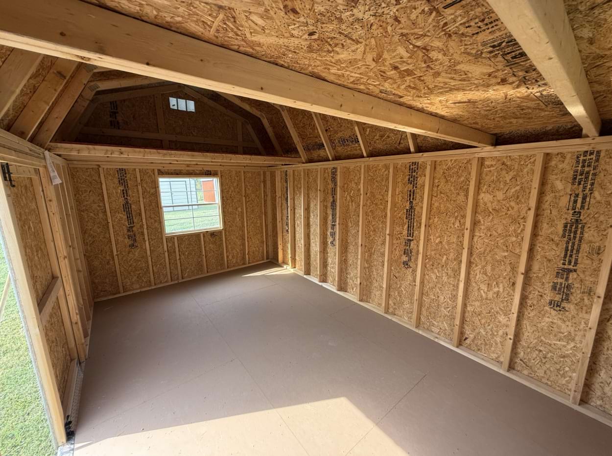 Lofted Barn that is ten feet by 16 feet framing with a window in loft and below loft