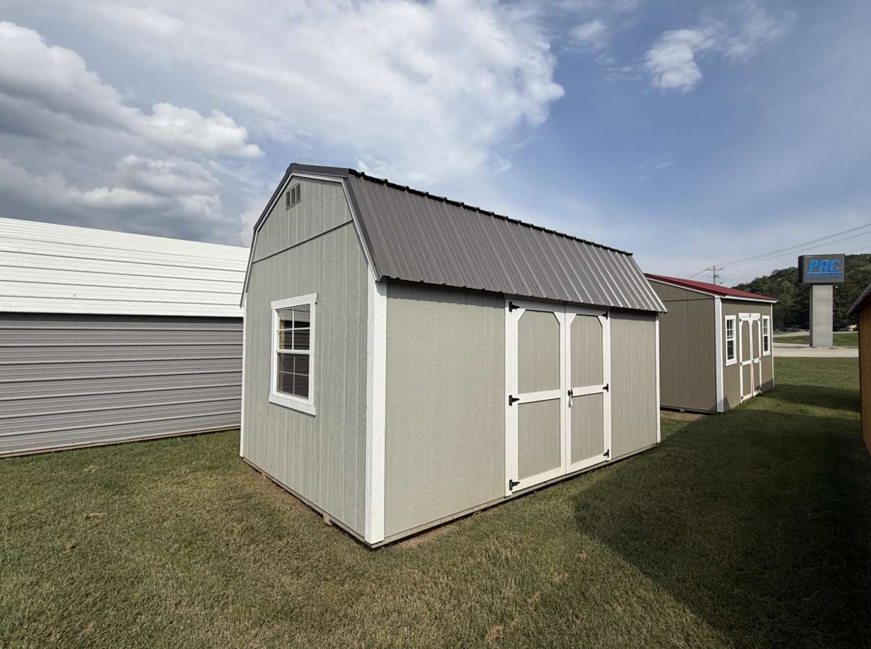 ten by sixteen lofted barn in a gap gray with white trim and a gray metal roof