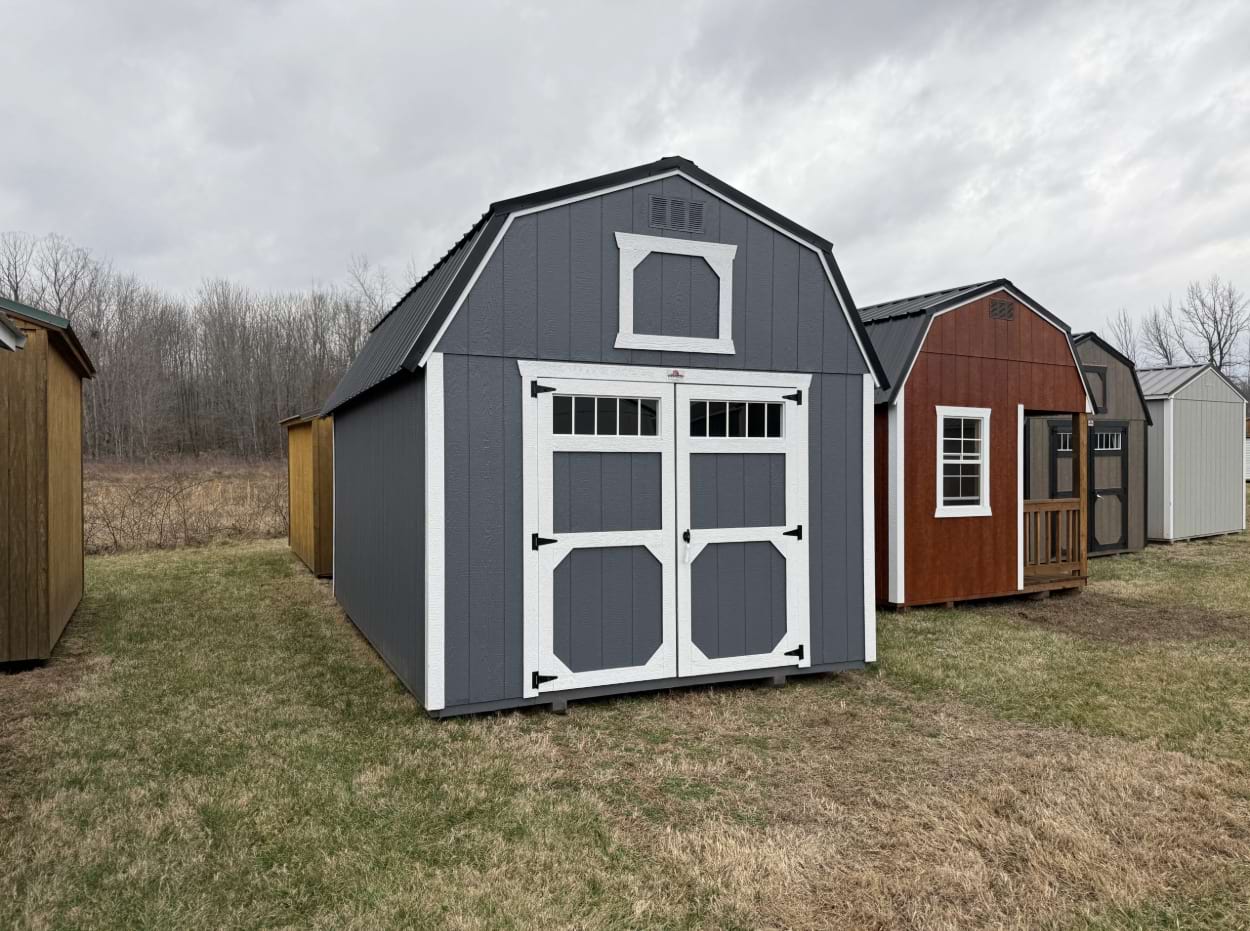 ten by sixteen lofted barn with gibraltar colored siding and white trim with a black metal roof