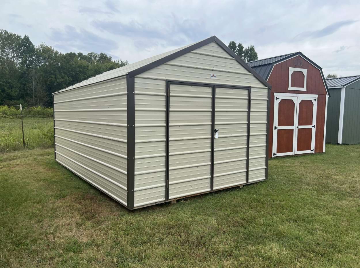 ten by sixteen metal shed outside shot with light stone colored metal siding