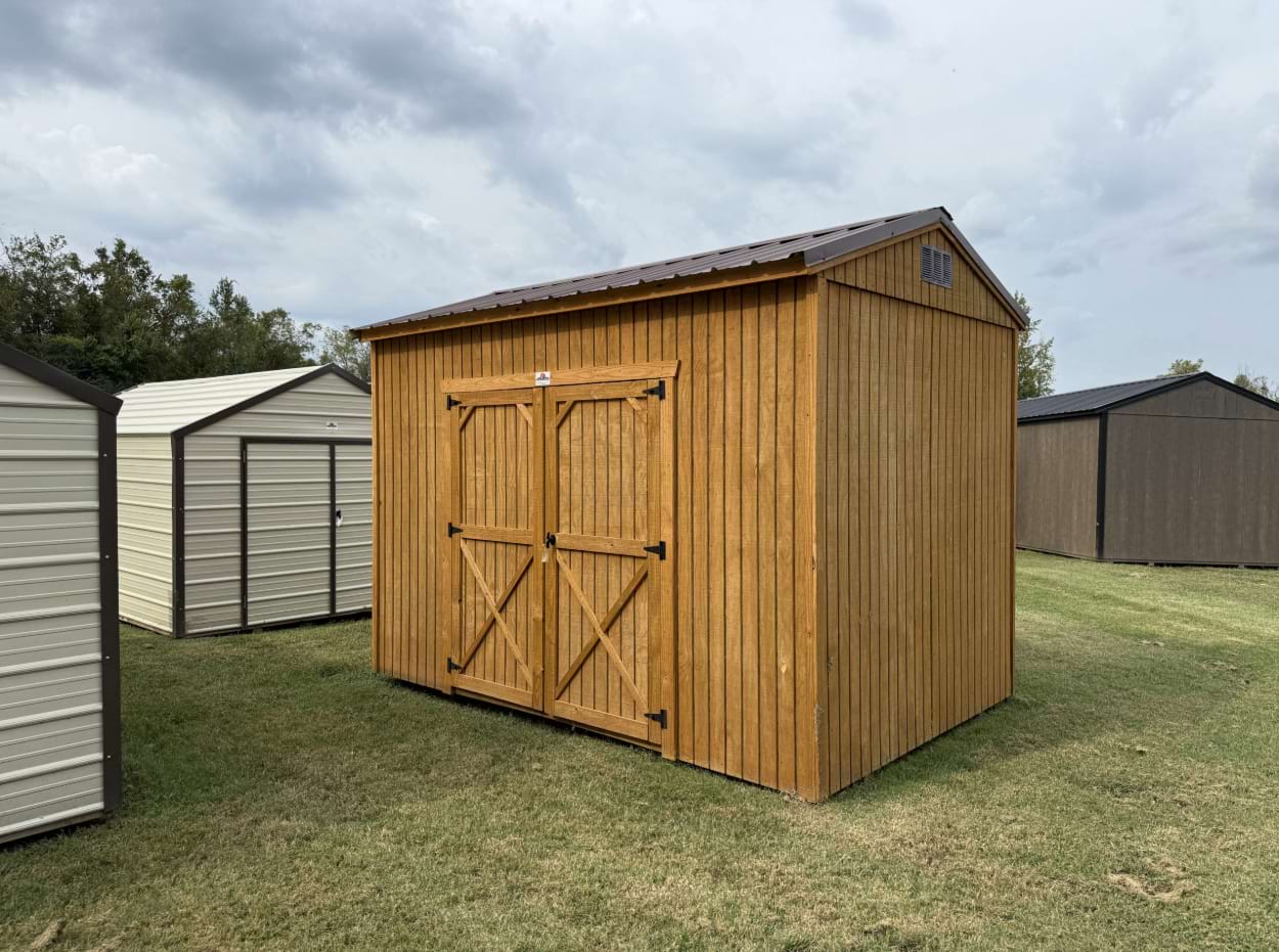 eight by twelve side utility shed with a golden brown wooden siding and brown metal roof