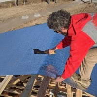 A Pac Building Pro worker installing Thermaguard Reflective Insulation
