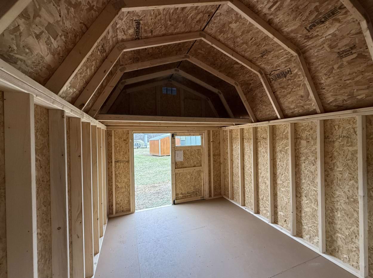 ten by sixteen lofted barn interior with door