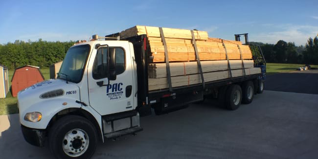 PAC delivery truck loaded with a framing lumber package