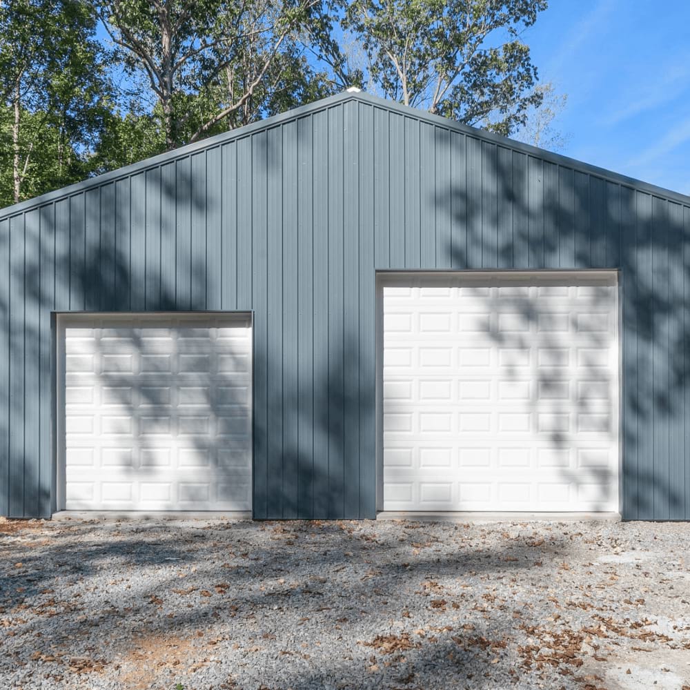 two Silver 5500 Series doors from the outside, of slightly different size