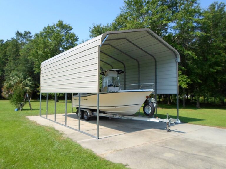 Steel carport sheltering a boat, installed by PAC Building Pro